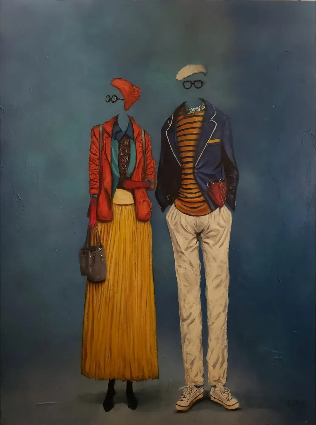 Fashionably Late: a couple in a red jacket with a pleated yellow skirt and a striped sweater with a navy blazer.